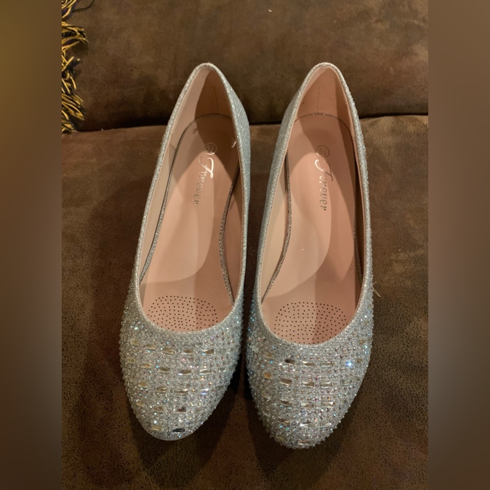 Excellent condition silver low wedge heels